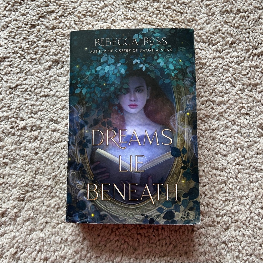 Dreams lie beneath by Rebecca Ross
